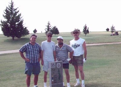 Four of us at the 16th hole.