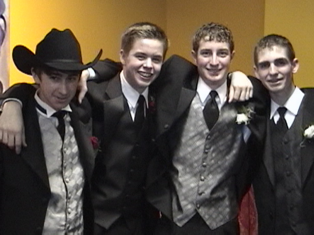 The fellas show off their tuxedos.