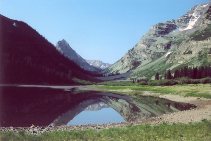 A reflection of of the Rockies in Crater Lake