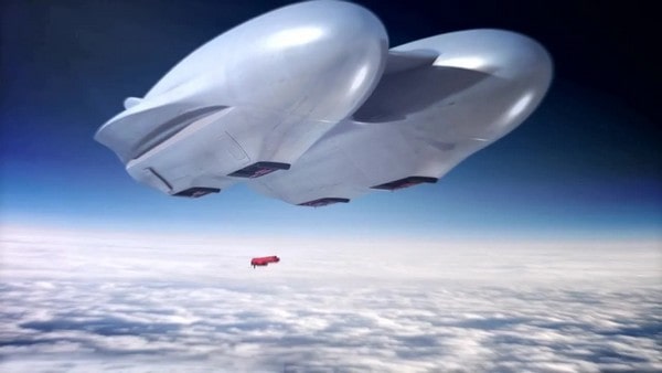 A high-flying military airship launches a missile