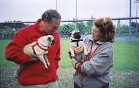 the twin pugs Bonnie and Buster, and family
