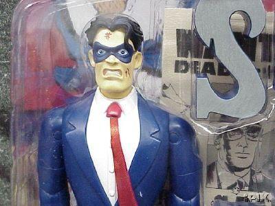 A close-up of the battle-worn head of the figure