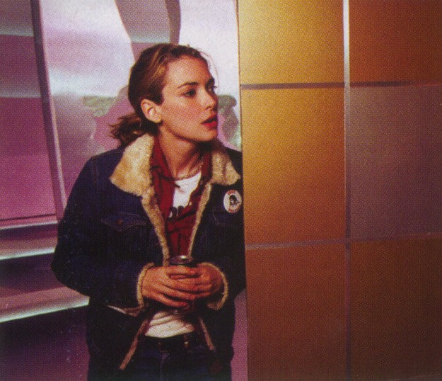 Winona keeps her eyes peeled for those mean security guys!