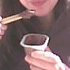 celia eats pudding with chopsticks
