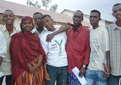 Khadra with Young men from traditonal Somaliland music and dance group.