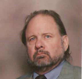 w/slight beard, eyes to the left; but a TIE AND COAT? - don't worry, as long as the MOON ISNT' FULL!!