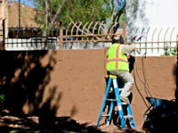 Repairing Spikes on
Fence Around Apt. Complex