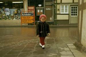 Joanne in front of our home in Hertsfeld 1963 just over 2 years old.?