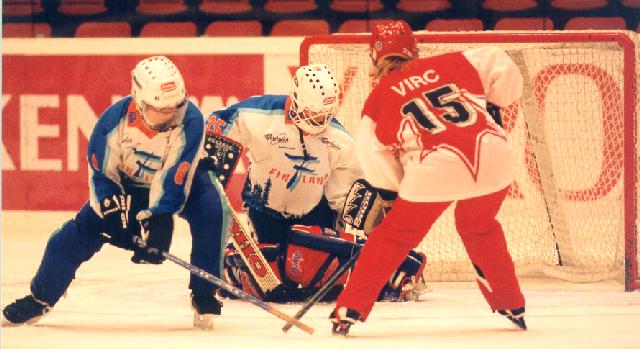 Rene Virc in Front of Finland's Goal.  1998 Suomen Ringetteliitto Ry - Finnish Ringette Association.