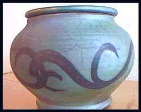 Raku fired porcelain urn