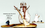 snowman and the bird hand carved piece