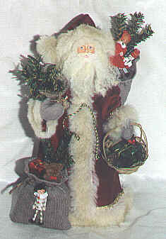 This santa stands approximately 27cm tall
