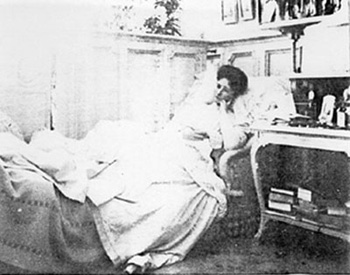 Alexandra relaxing in her mauve boudoir
