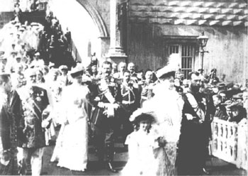 The Romanovs walking outside the Kremlin