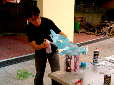 Applying the last touches to the headgear. Looking cool, eh...