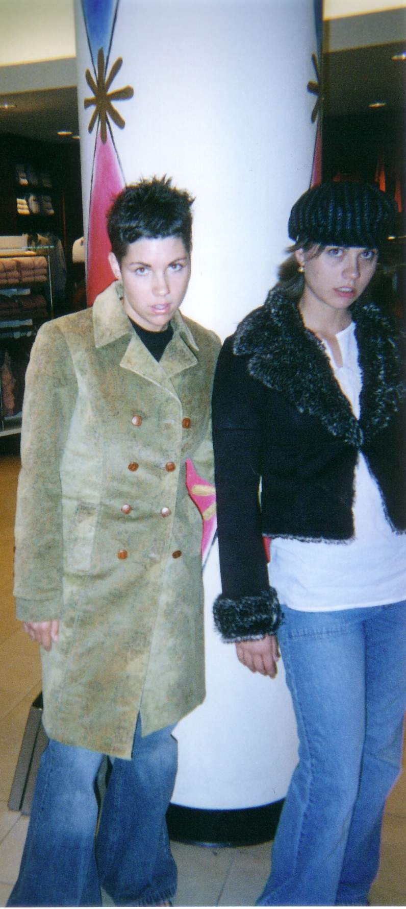 Katie and Jessica's modeling stint in the greatest coat ever designed...ehm...the green one.