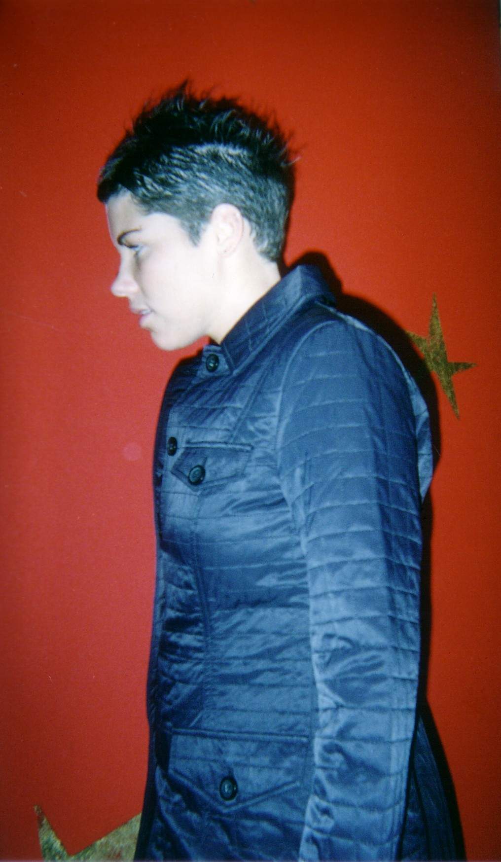 This is what Jessica looks like from the side in a great coat.