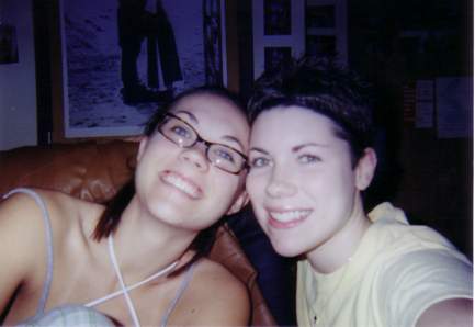 Katie and Jessica being silly in Jessica's room.