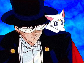 Arty sittin' on Tux's shoulder-- tres kawaii!