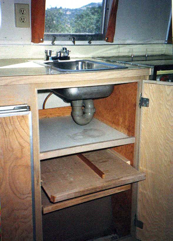 Slide out shelves under the sink