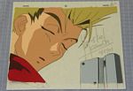 Kuroda Yousuke signed his name between Vash The Stampede and his trusty gun on this TRIGUN cel!