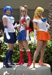 Well, what do you know?  Looks like there's a trio of other Sailor Scouts -- Ami Mizuno (Sailor Mercury), Usagi Tsukino (SAILOR MOON) & Minako Aino (Sailor Venus) -- striking a pose nearby!