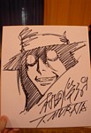 After 5 years of attending AX, I finally win my first sketch from a Guest Of Honor raffle!  But since the artist Toshiharu Murata could draw so effortlessly, he ends up sketching for almost everyone in line, erasing any special distinction that my HELLSING illustration of Alucard might have had!