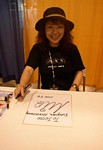 MIQ (or the artist formerly known as MIO) has performed theme songs for several classic anime, such as GUNDAM 0083 ~ STARDUST MEMORY and AURA BATTLER DUBINE!  Unfortunately, anime is a youngster's hobby, so sadly very few folks show up for her signing!