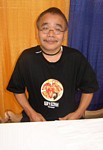 How tough is it for Masao Maruyama?  He's president and founder of the legendary MADHOUSE STUDIOS, which has produced countless hit titles from NINJA SCROLL to METROPOLIS!  But with his autograph session just before Seki Tomokazu's, he basically earns a bonus hour to nap!