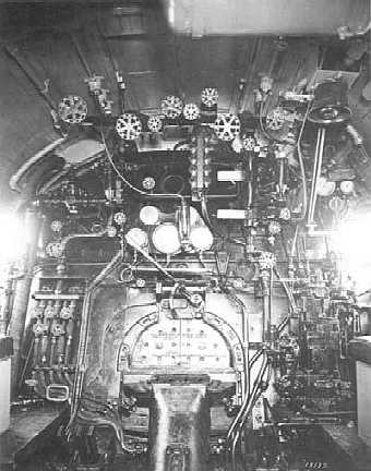 This is cab area of a steam engine.  Lots of valves and levers!