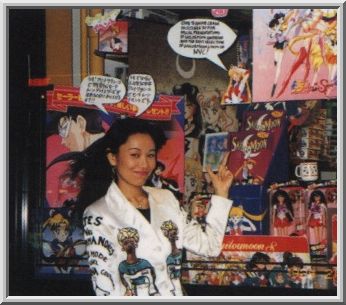 Posing with all the various Sailor Moon merchandise.  Jeez, I wish I had all that stuff in the window [sniff ^_^*]