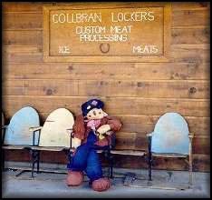 Scarecrow on gossip bench in Collbran