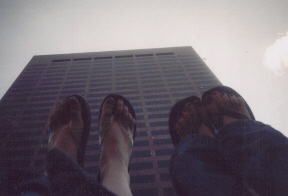 Chelle and my feet. We laid on the ground and stuck up our feet so we'd be walking on the side of the tall building