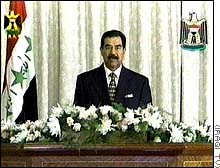 Saddam Hussein with Flowers