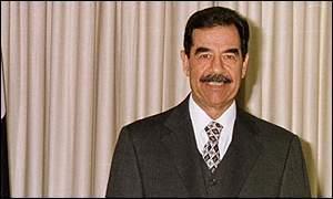 Saddam Hussein smiling