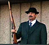 Saddam Hussein with Rifle