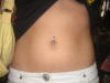 close up of the belly button ring
