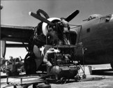 Work on a B-24
                        engine