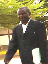 Barrister Mbi Jonas, carrying his files of doki in Kumba.