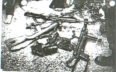 Weapons captured from Viet Cong guerrillas during an HMM-365 operation - photo by Marty winkel