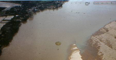 HMM-365 swooping in to rescue a pilot of an air force f-100 who had parachuted after being shot down by enemy ground fire: photo by J.R. Jacobs