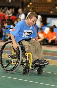 Young athletes in track-in-field in wheelchair
