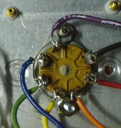 Photo showing wires hooked through eyes in terminals instead of being wrapped around.