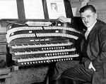 Jesse Crawford at the Robert-Morton theatre organ installed in Miller's California Theatre, Los Angeles