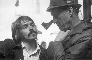 Steve Prefontane and his coach discussing the upcoming race