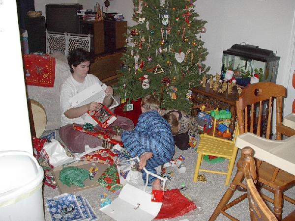 Matilda, Gareth, and Tristin tearing into the presents