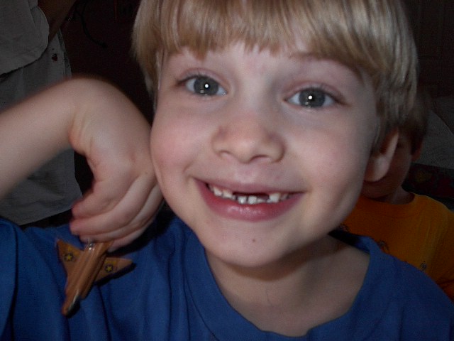 Tristin playing indoors.  Love that grin!