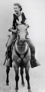 Kevin Costner riding Justin