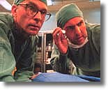 Brad Dourif, Arnold Vosloo