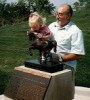 Dad and Bethie with a horse statue
